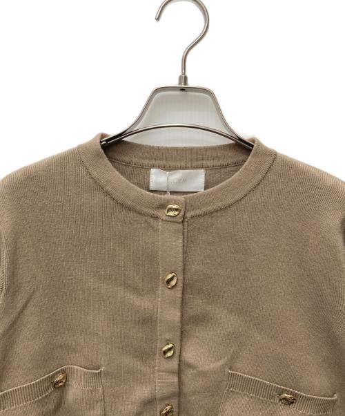 ACYM（アシーム）ACYM (アシーム) ポイントボタンニットカーディガン ベージュ サイズ:FREE 未使用品の古着・服飾アイテム
