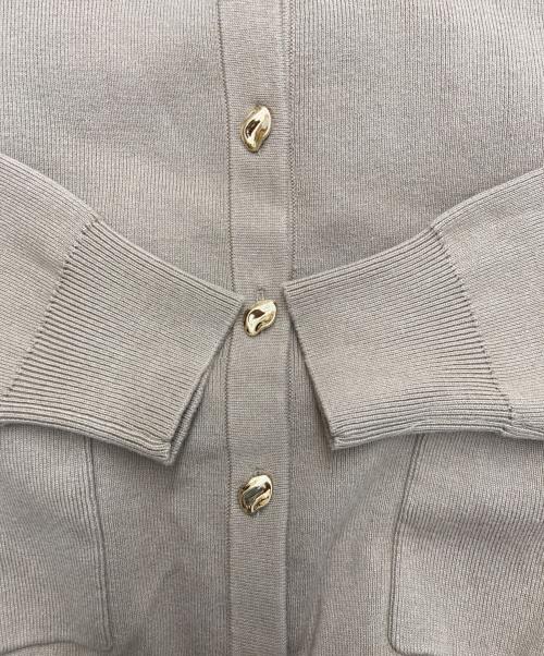 ACYM（アシーム）ACYM (アシーム) ポイントボタンニットカーディガン ベージュ サイズ:FREE 未使用品の古着・服飾アイテム