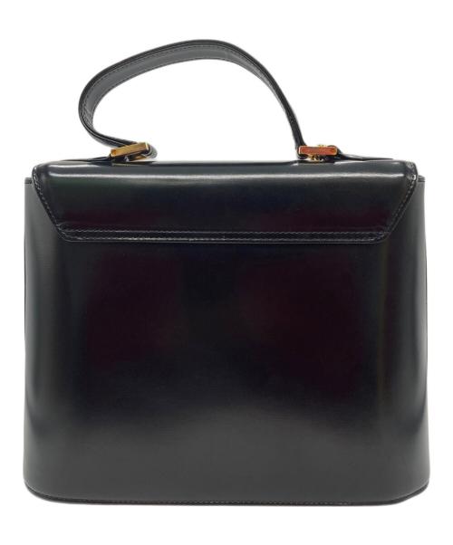 Yves Saint Laurent（イヴサンローラン）Yves Saint Laurent (イヴサンローラン) ロゴチャーム付きハンドバッグ ブラックの古着・服飾アイテム