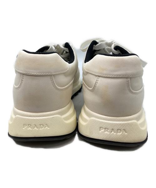 PRADA（プラダ）PRADA (プラダ) ロゴキャンバススニーカー ホワイト サイズ:7の古着・服飾アイテム