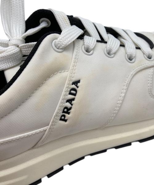 PRADA（プラダ）PRADA (プラダ) ロゴキャンバススニーカー ホワイト サイズ:7の古着・服飾アイテム