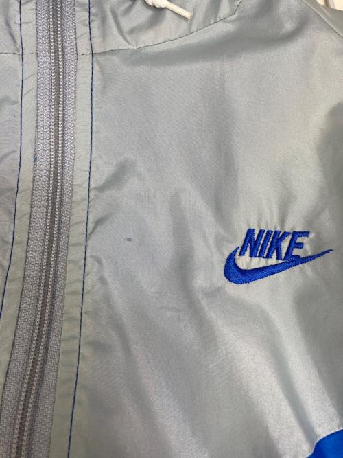NIKE（ナイキ）NIKE (ナイキ) ウインドブレーカー ブルー×グレー サイズ:Lの古着・服飾アイテム
