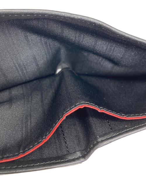 TUMI（トゥミ）TUMI (トゥミ) 財布 ブラックの古着・服飾アイテム