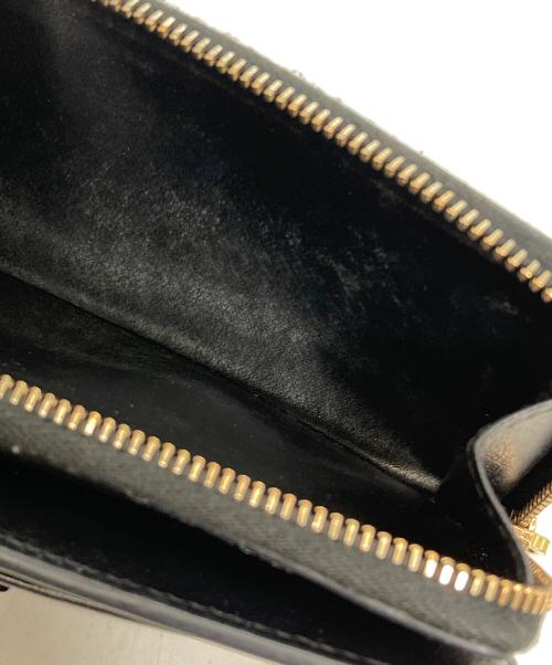 TOD'S（トッズ）TOD'S (トッズ) 長財布　Tタイムレス ブラックの古着・服飾アイテム
