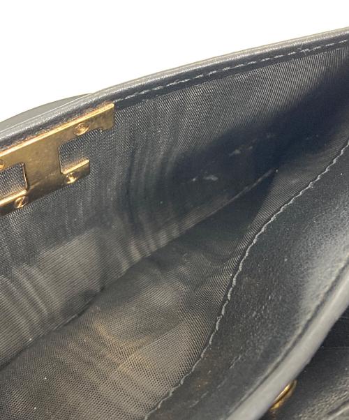 TOD'S（トッズ）TOD'S (トッズ) 長財布　Tタイムレス ブラックの古着・服飾アイテム