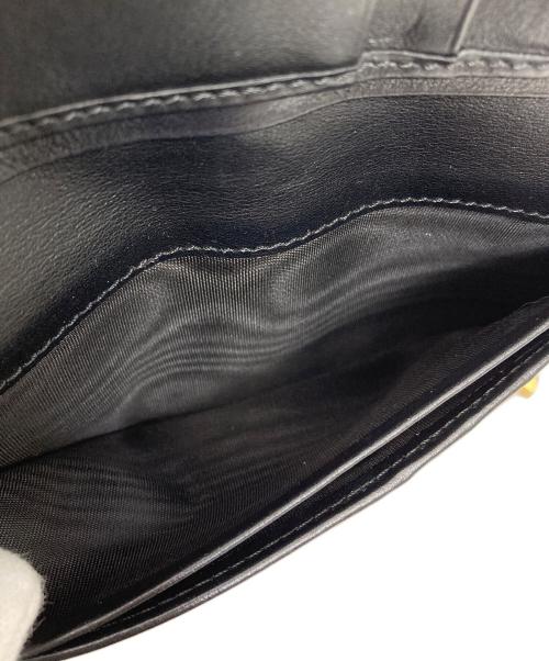 TOD'S（トッズ）TOD'S (トッズ) 長財布　Tタイムレス ブラックの古着・服飾アイテム