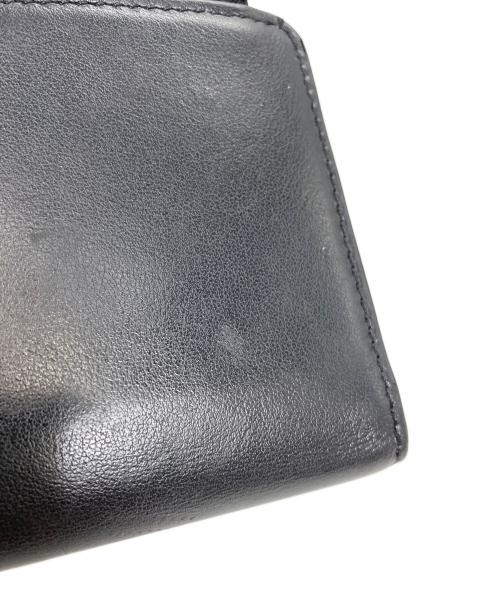TOD'S（トッズ）TOD'S (トッズ) 長財布　Tタイムレス ブラックの古着・服飾アイテム