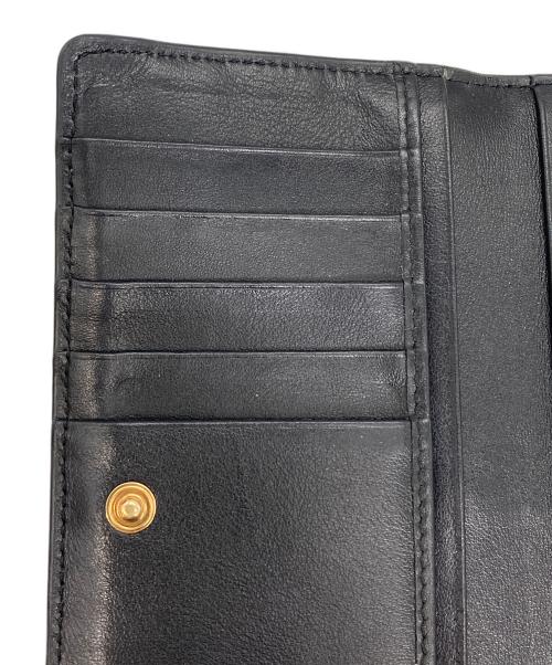 TOD'S（トッズ）TOD'S (トッズ) 長財布　Tタイムレス ブラックの古着・服飾アイテム