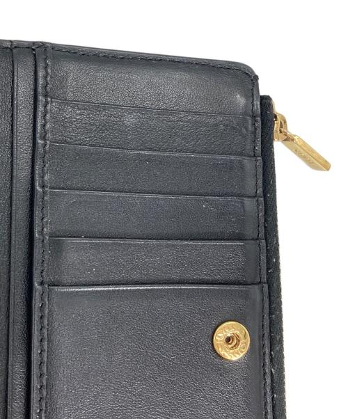 TOD'S（トッズ）TOD'S (トッズ) 長財布　Tタイムレス ブラックの古着・服飾アイテム