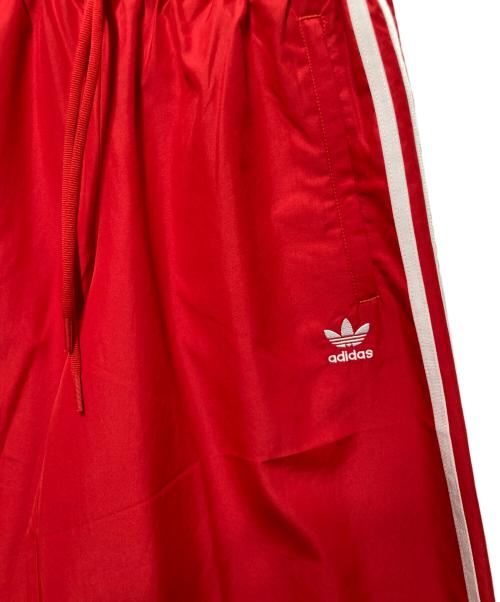 adidas（アディダス）adidas (アディダス) ファイヤーバード オーバーサイズド トラックパンツ レッド サイズ:xsの古着・服飾アイテム
