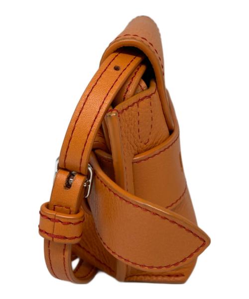 J&M DAVIDSON（ジェイ＆エム デヴィッドソン）J&M DAVIDSON (ジェイ＆エム デヴィッドソン) ナノベルトバッグ オレンジの古着・服飾アイテム