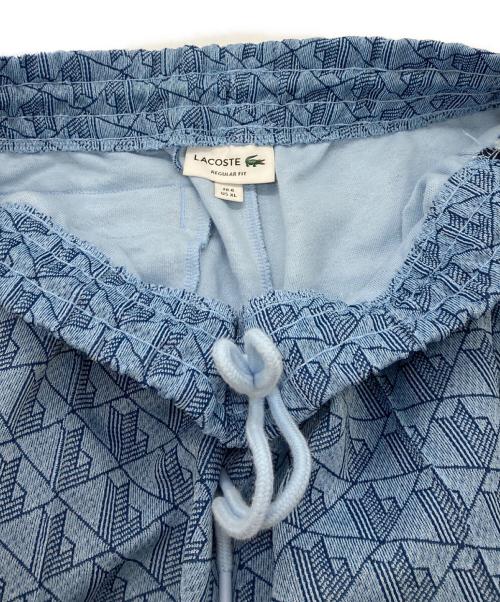 LACOSTE（ラコステ）LACOSTE (ラコステ) モノグラムジャガードトラックパンツ ブルー サイズ:XLの古着・服飾アイテム