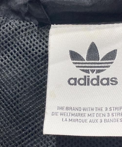 adidas（アディダス）adidas (アディダス) NEW CASTLE UNITED (ニューカッスル・ユナイテッド) ナイロンジャケット ブラック×ブルー サイズ:Mの古着・服飾アイテム