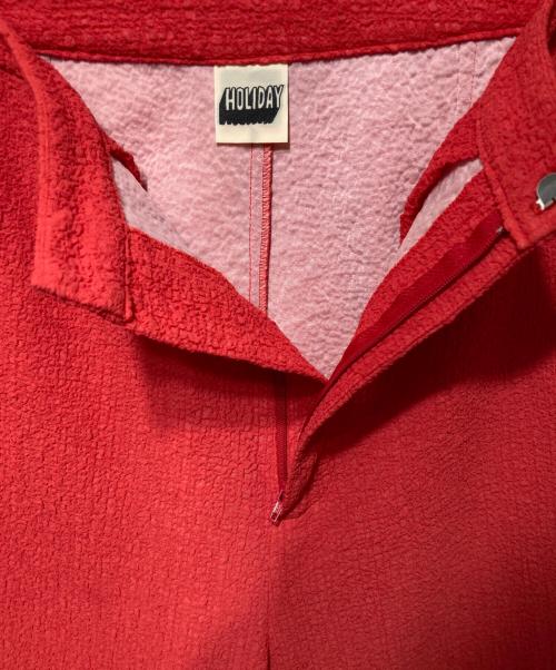 holiday（ホリデー）HOLIDAY (ホリデー) BONDING FLARE PANTS レッドの古着・服飾アイテム