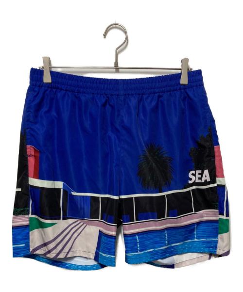 WIND AND SEA（ウィンダンシー）WIND AND SEA (ウィンダンシー) 永井 博 (Hiroshi Nagai) ショートパンツ ブルー サイズ:Lの古着・服飾アイテム