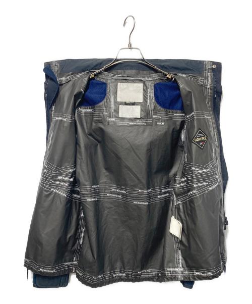 WHITE MOUNTAINEERING（ホワイトマウンテ二アニング）WHITE MOUNTAINEERING (ホワイトマウンテ二アニング) ゴアテックスマウンテンパーカー ネイビー×グレー サイズ:Ｍの古着・服飾アイテム