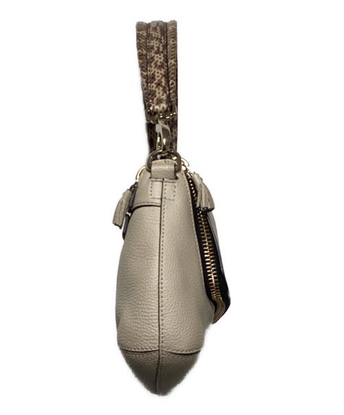 ANYA HINDMARCH（アニヤ・ハインドマーチ）ANYA HINDMARCH (アニヤ・ハインドマーチ) マキシジップ2WAYバッグ ベージュの古着・服飾アイテム
