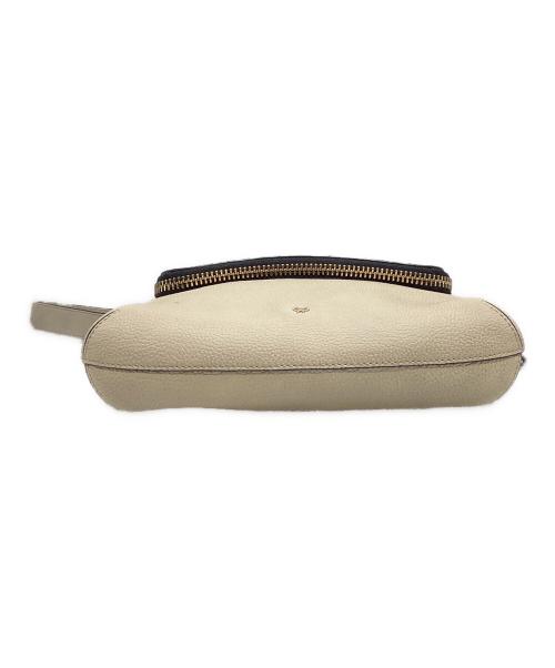 ANYA HINDMARCH（アニヤ・ハインドマーチ）ANYA HINDMARCH (アニヤ・ハインドマーチ) マキシジップ2WAYバッグ ベージュの古着・服飾アイテム