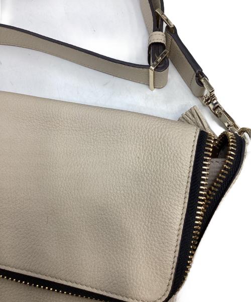 ANYA HINDMARCH（アニヤ・ハインドマーチ）ANYA HINDMARCH (アニヤ・ハインドマーチ) マキシジップ2WAYバッグ ベージュの古着・服飾アイテム