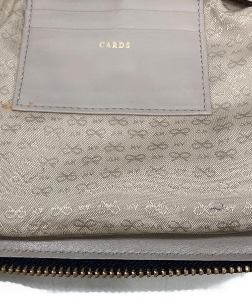 ANYA HINDMARCH（アニヤ・ハインドマーチ）ANYA HINDMARCH (アニヤ・ハインドマーチ) マキシジップ2WAYバッグ ベージュの古着・服飾アイテム