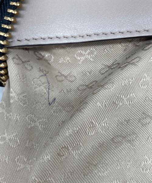 ANYA HINDMARCH（アニヤ・ハインドマーチ）ANYA HINDMARCH (アニヤ・ハインドマーチ) マキシジップ2WAYバッグ ベージュの古着・服飾アイテム