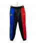 JORDAN（ジョーダン）の古着「ジョガーパンツ」｜ブラック×レッド×ブルー