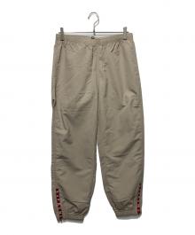 SUPREME（シュプリーム）の古着「ウォームアップパンツ」｜ベージュ