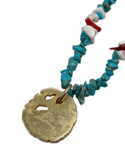 MUZE（ミューズ）MUZE (ミューズ) EMPTY SETT (エンプティ―セット) エンブレム ストーン ネックレス ターコイズ ブルー×ゴールドの古着・服飾アイテム