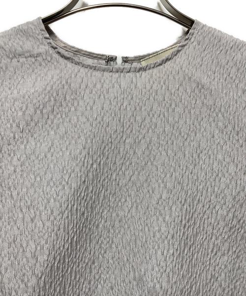 UNITED ARROWS TOKYO（ユナイテッドアローズトウキョウ）UNITED ARROWS TOKYO (ユナイテッドアローズトウキョウ) エアリージャカード ペプラムブラウス グレー サイズ:36の古着・服飾アイテム
