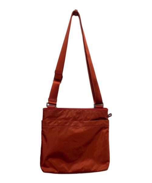 TUMI（トゥミ）TUMI (トゥミ) ショルダーバッグ オレンジの古着・服飾アイテム