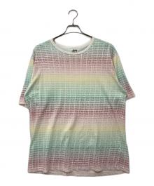 stussy（ステューシー）の古着「総柄ロゴTシャツ」｜マルチカラー