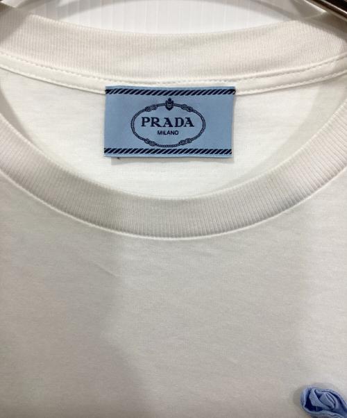 PRADA（プラダ）PRADA (プラダ) フラワー装飾ポケットTシャツ ホワイト サイズ:XSの古着・服飾アイテム