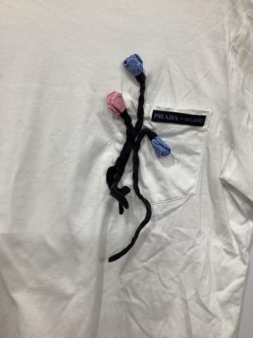 PRADA（プラダ）PRADA (プラダ) フラワー装飾ポケットTシャツ ホワイト サイズ:XSの古着・服飾アイテム