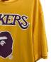 中古・古着 A BATHING APE (アベイシングエイプ) MITCHELL & NESS (ミッチェルアンドネス) Lakers Tee イエロー サイズ:L：6000円