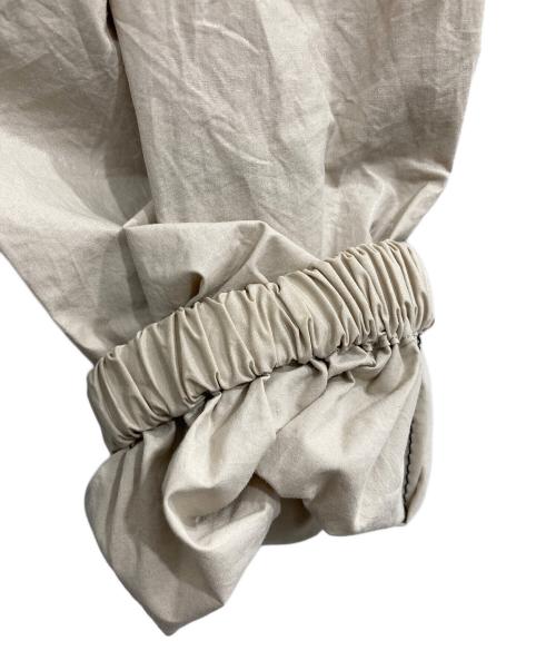 martin kim（マーティンキム）martin kim (マーティンキム) コーティングロゴジャケット ベージュ サイズ:Fの古着・服飾アイテム