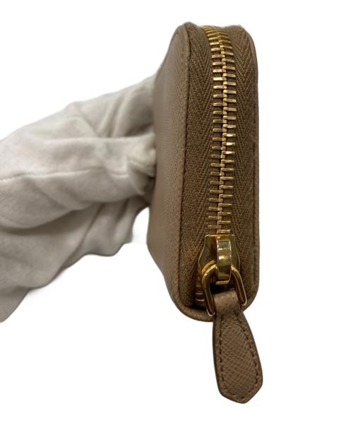 PRADA（プラダ）PRADA (プラダ) コンパクトウォレット ベージュの古着・服飾アイテム