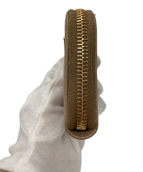 PRADA（プラダ）PRADA (プラダ) コンパクトウォレット ベージュの古着・服飾アイテム