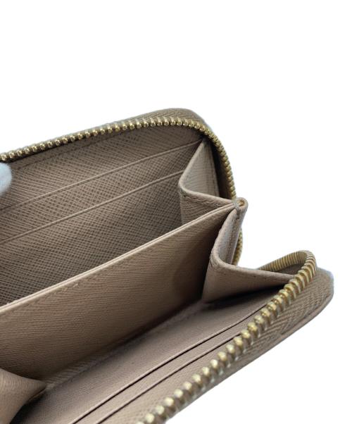 PRADA（プラダ）PRADA (プラダ) コンパクトウォレット ベージュの古着・服飾アイテム