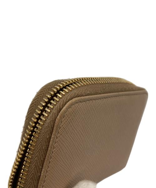 PRADA（プラダ）PRADA (プラダ) コンパクトウォレット ベージュの古着・服飾アイテム