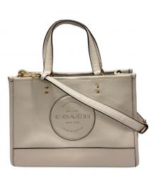 COACH（コーチ）の古着「デンプシー キャリーオール ウィズ パッチ」｜アイボリー