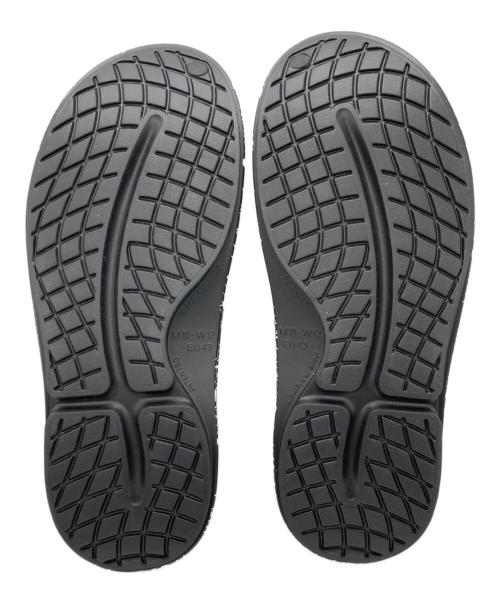 TAKAHIROMIYASHITA TheSoloIst.（タカヒロミヤシタ ザソロイスト）TAKAHIROMIYASHITA TheSoloIst. (タカヒロミヤシタ ザソロイスト) OOFOS (ウーフォス) sof.0026 clog.(music note) ブラック サイズ:US10の古着・服飾アイテム