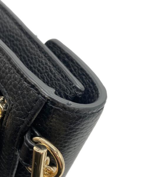 COLE HAAN（コールハーン）COLE HAAN (コールハーン) オーバーサイズ クロージャー フォン ケース ブラックの古着・服飾アイテム