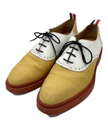 Thom Browne（トムブラウン）の古着「サドルシューズ」｜イエロー×ホワイト
