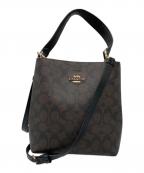 COACHコーチ）の古着「スモール タウン バケット バッグ シグネチャー キャンバス」｜ブラウン