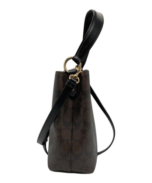COACH（コーチ）COACH (コーチ) スモール タウン バケット バッグ シグネチャー キャンバス ブラウンの古着・服飾アイテム
