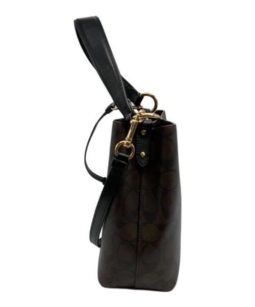 COACH（コーチ）COACH (コーチ) スモール タウン バケット バッグ シグネチャー キャンバス ブラウンの古着・服飾アイテム