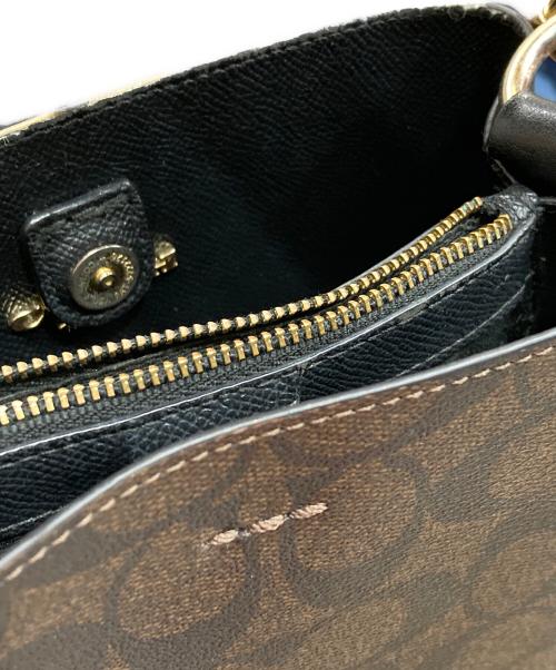 COACH（コーチ）COACH (コーチ) スモール タウン バケット バッグ シグネチャー キャンバス ブラウンの古着・服飾アイテム