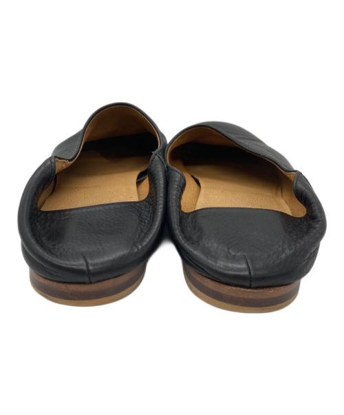 que（キュー）que (キュー) レザースリッポン ブラック サイズ:Mの古着・服飾アイテム