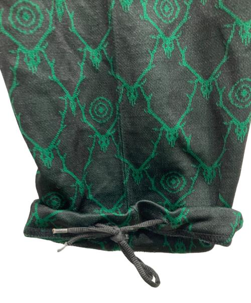 South2 West8（サウスツー ウエストエイト）South2 West8 (サウスツー ウエストエイト) 総柄トラックパンツ グリーン サイズ:XSの古着・服飾アイテム