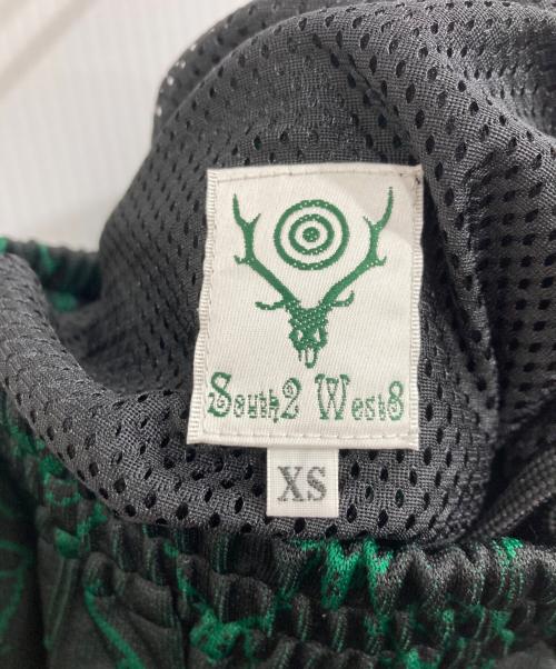 South2 West8（サウスツー ウエストエイト）South2 West8 (サウスツー ウエストエイト) 総柄トラックパンツ グリーン サイズ:XSの古着・服飾アイテム